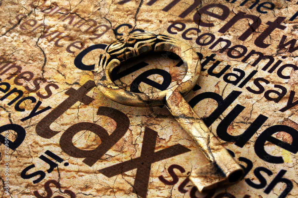 Naklejka premium Golden key on tax