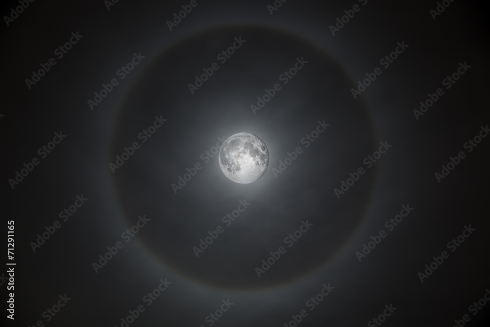 Magnificent full moon with misty halo