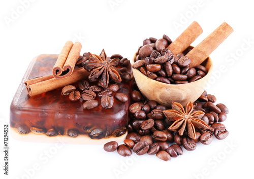 Organic soap with coffee beans and spices, isolated on white