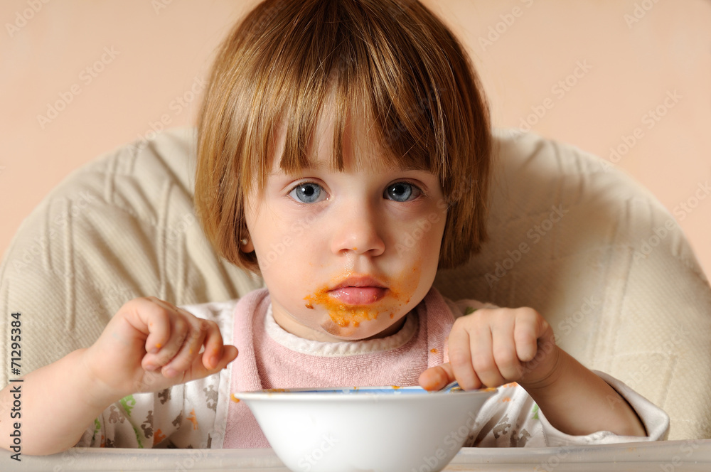 girl finished eating spaghetti sitting on highchair girl finished eating spaghetti sitting on highchair
