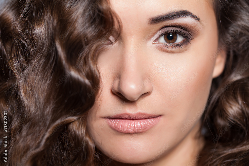 Portrait of a young brunette woman with beautiful hair Portrait of a young brunette woman with beautiful hair