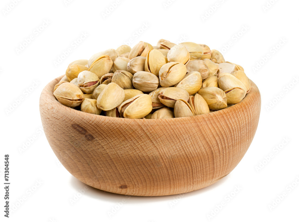 bowl of pistachio isolated on white bowl of pistachio isolated on white