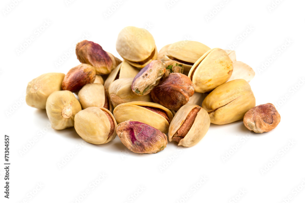 heap of pistachio isolated on white heap of pistachio isolated on white