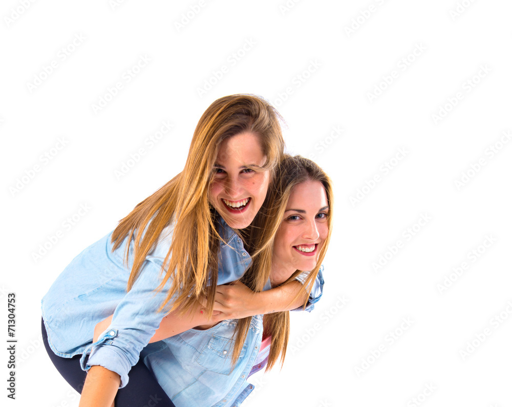 Friends playing over isolated white background Friends playing over isolated white background