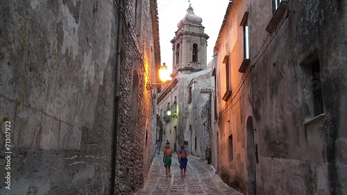 Tourists on the cobbled streets of the medieval Erice city
