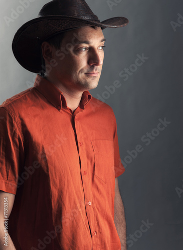 man in a cowboy hat © spaxiax