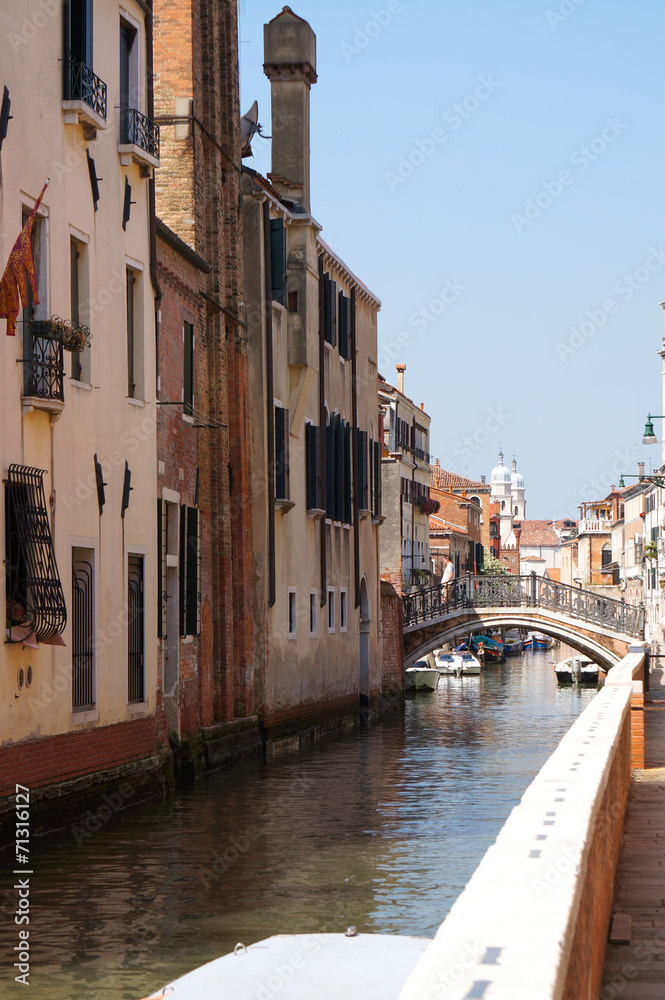 Venetian canal with bridge