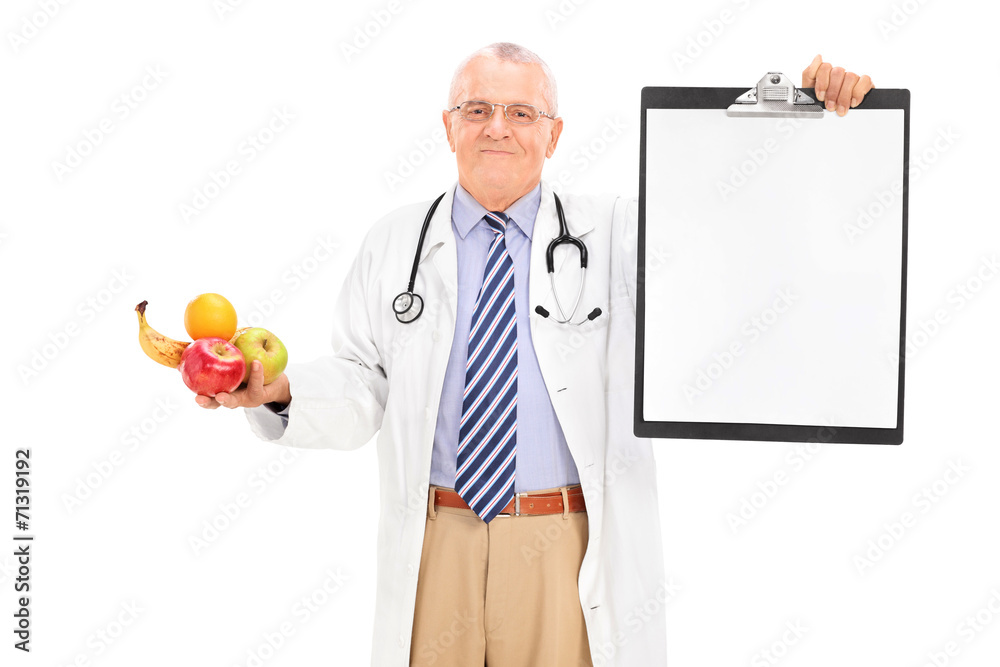 Doctor holding clipboard and a bunch of fruits Doctor holding clipboard and a bunch of fruits