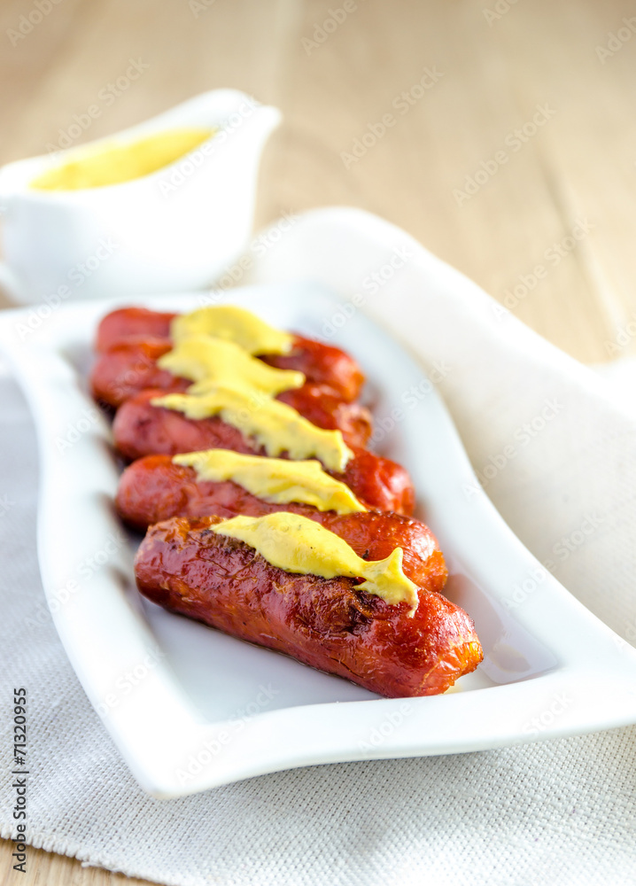 Roasted sausages with mustard sauce Roasted sausages with mustard sauce