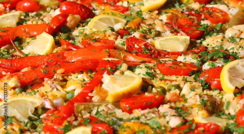 paella valenciana with seafood and vegetables