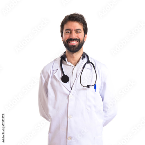 Happy doctor over white background