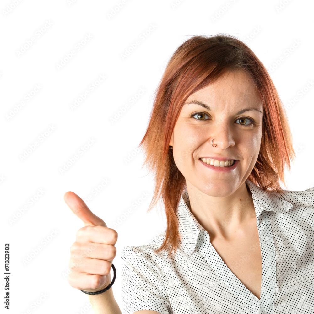 Girl with thumb up over white background Girl with thumb up over white background