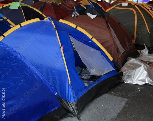 Many tents on street photo