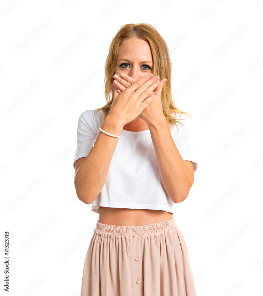 Pretty girl doing surprise gesture over white background Pretty girl doing surprise gesture over white background