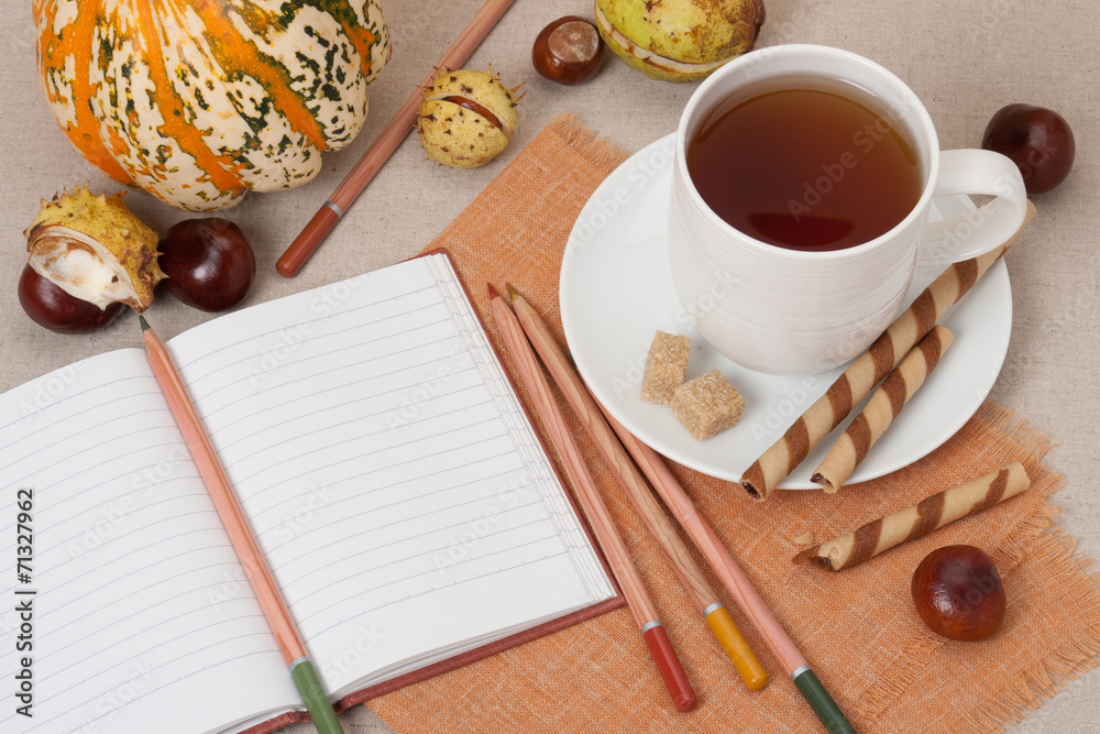 Opened Notebook. Cup Of Hot Tea With Sweets. Natural Linen Table