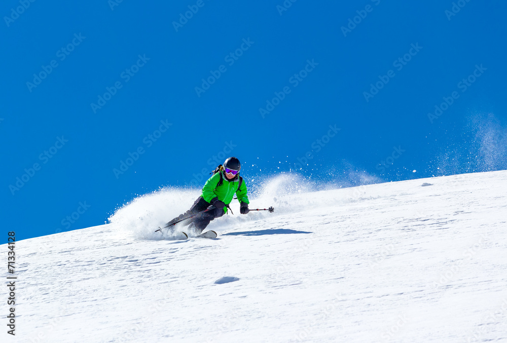 Skier on a sky background