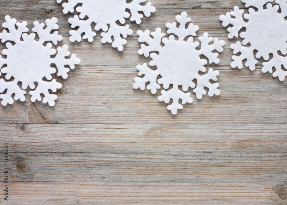 Snowflakes on old wood - background Snowflakes on old wood - background