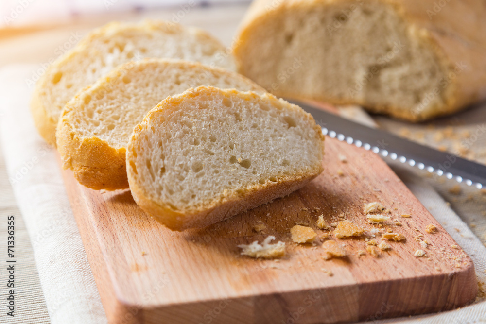 Bread Slices on a Cutting Board Bread Slices on a Cutting Board