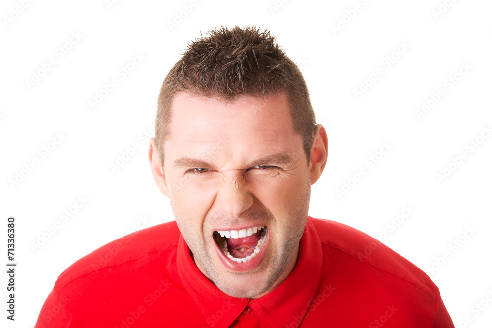 Young angry man screaming Young angry man screaming