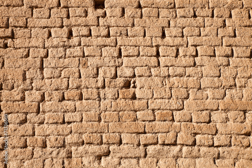 Adobe brick wall photo