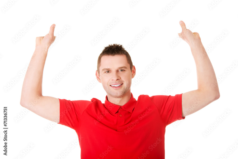 Happy man showing and displaying placard Happy man showing and displaying placard