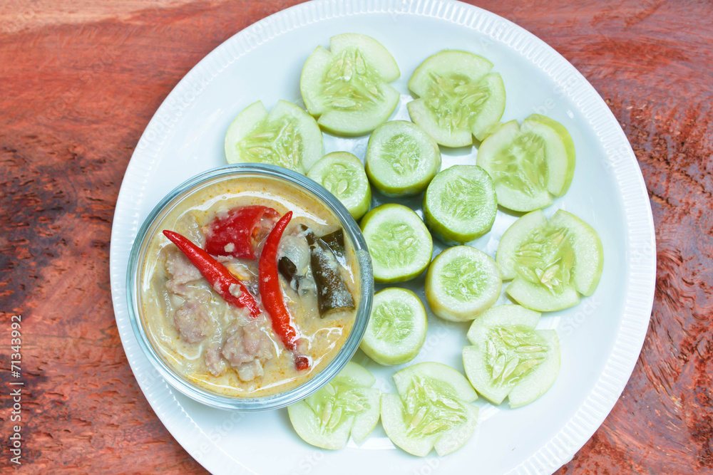 Simmer pork chops with cucumber.