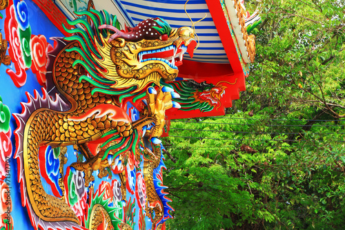 Chinese dragons statue on the wall.