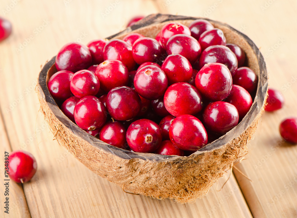 Cranberries on a wooden background Cranberries on a wooden background