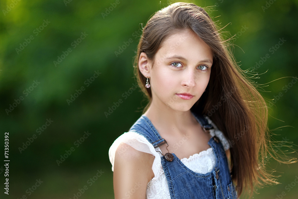 portrait of little girl outdoors in summer portrait of little girl outdoors in summer
