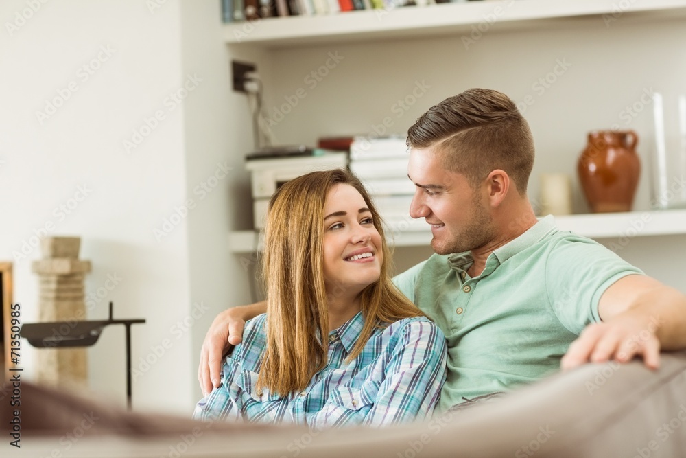 Cute couple relaxing on couch Cute couple relaxing on couch