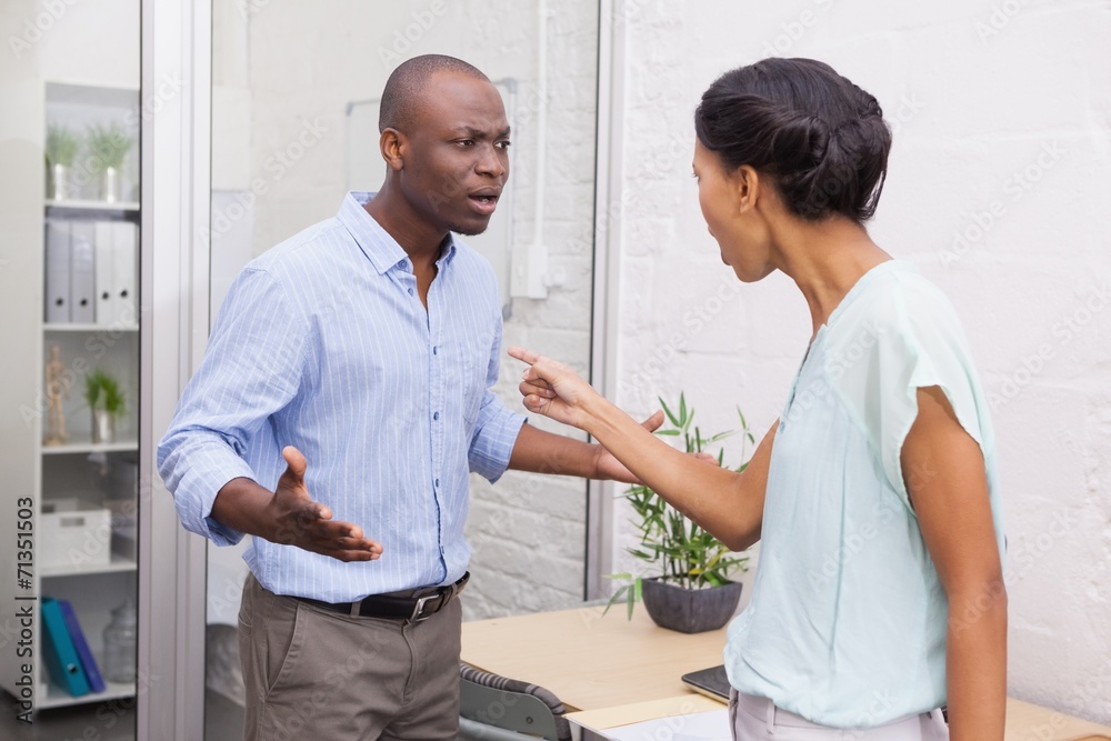Casual business partners having an argument Casual business partners having an argument
