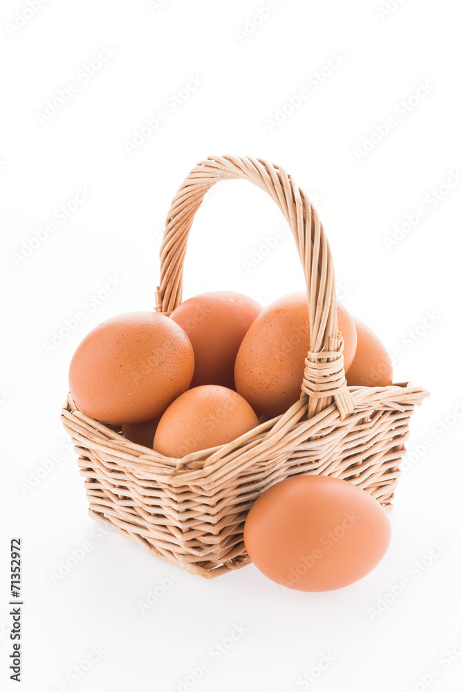 Eggs in basket isolated on white background Eggs in basket isolated on white background
