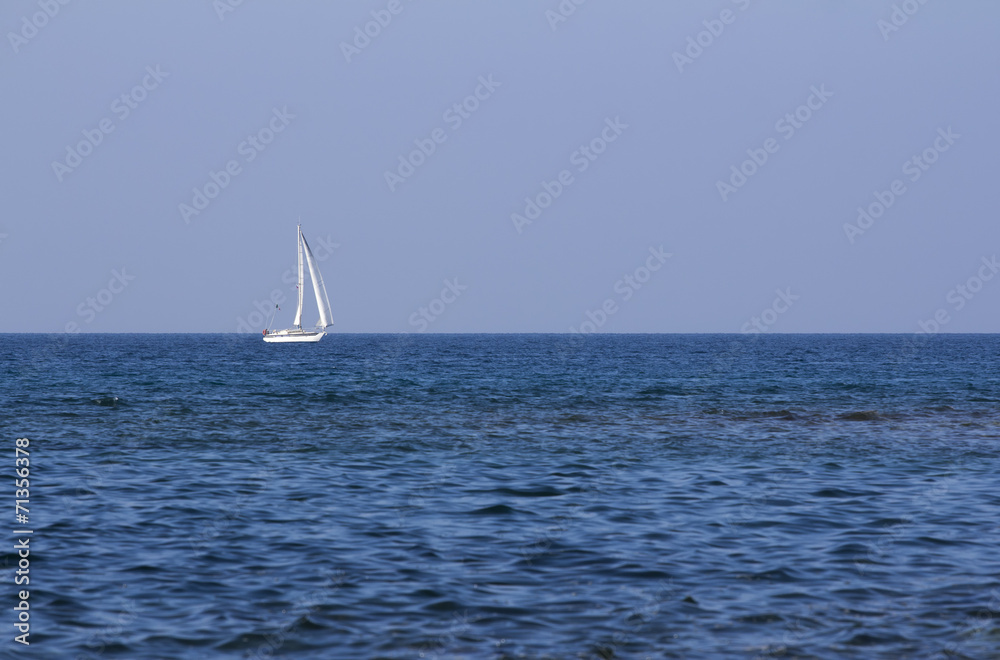 Sailing boat on the open sea.