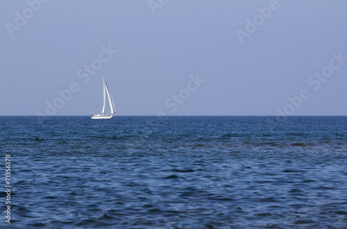 Sailing boat on the open sea.