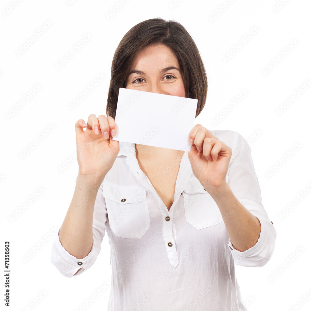 Beautiful young woman showing a blank business card Beautiful young woman showing a blank business card