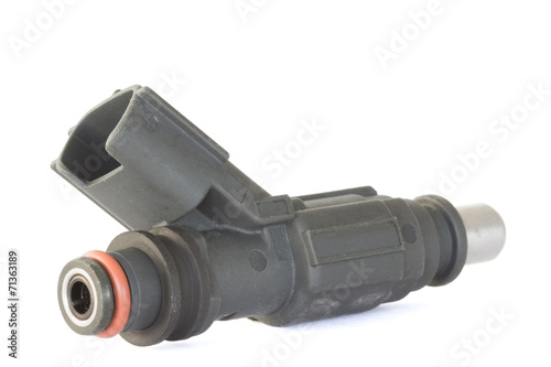 Used fuel injector on a white background