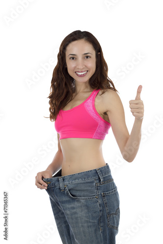 Successful happy weight loss woman thumb up