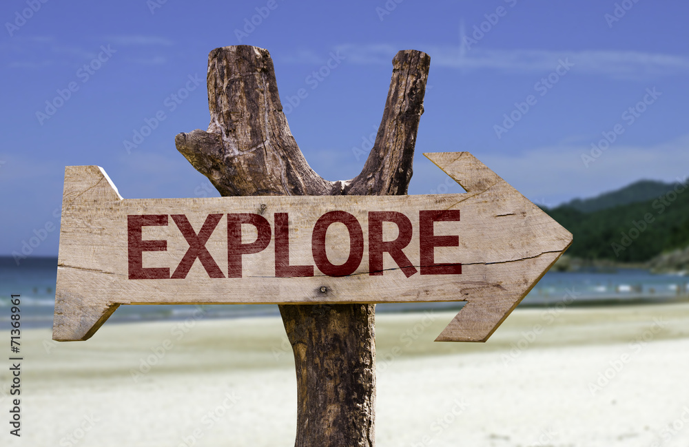 Explore wooden sign with a beach on background