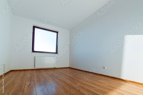 Apartment interior with wooden floor after renovation