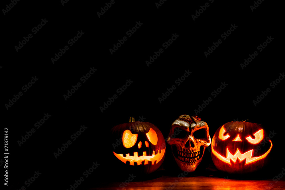 Scary Halloween pumpkins isolated on black Scary Halloween pumpkins isolated on black