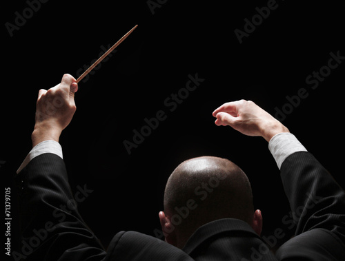 Concert conductor with a baton