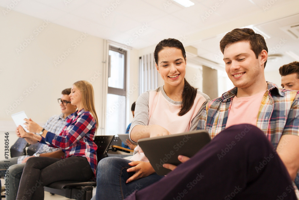 group of smiling students with tablet pc group of smiling students with tablet pc