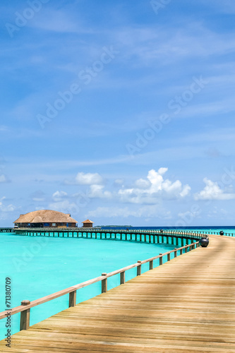 view of water bungalow in irufushi island, maldives