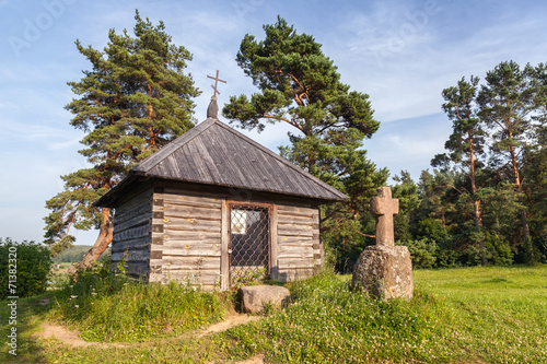 Ancient Orthodox chapel and a stone cross on Savkina gorka