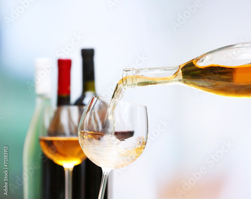Wine pouring into wine glass, close-up