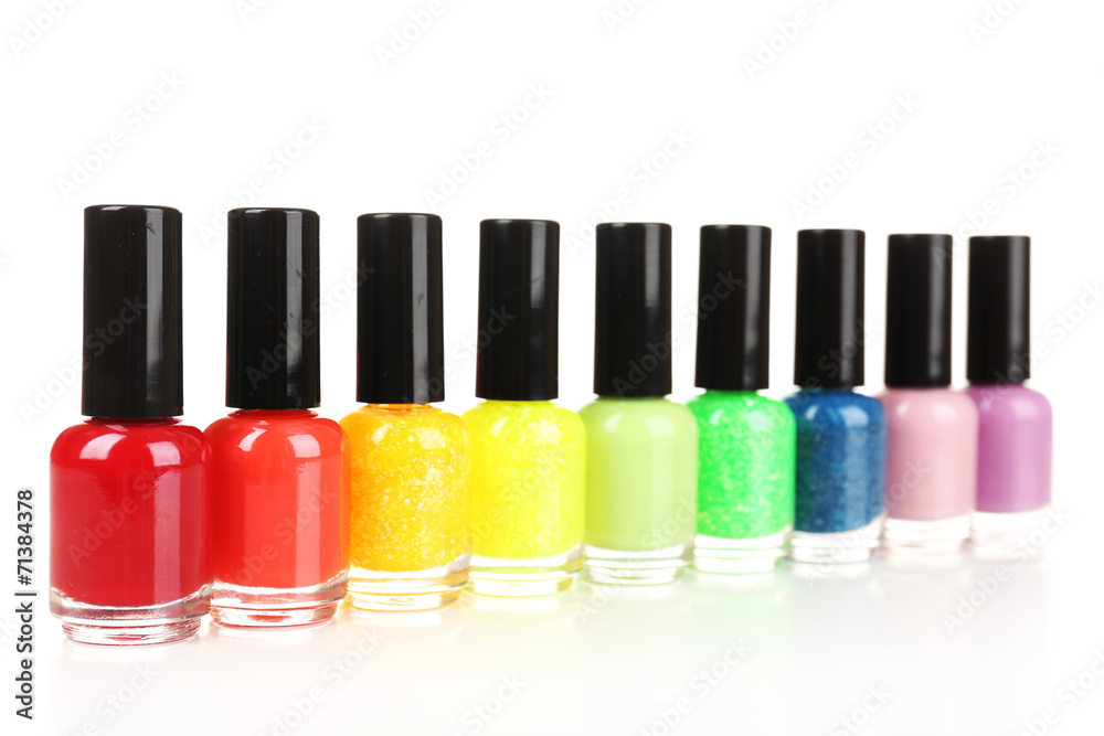 Colorful nail polishes, isolated on white