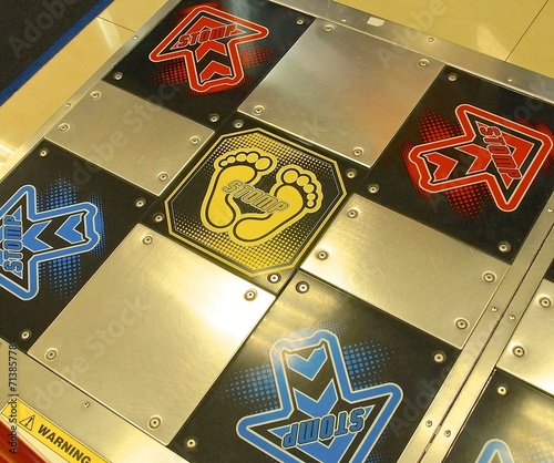 Dance Dance Revolution pad closeup in arcade