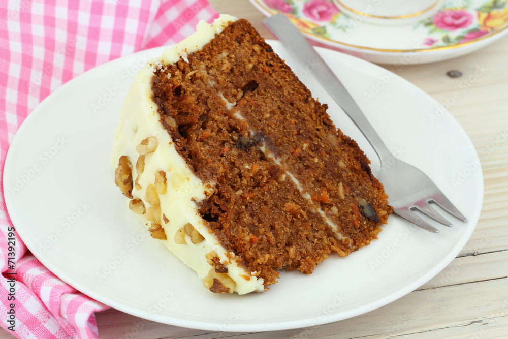 Carrot cake with walnuts and marzipan icing