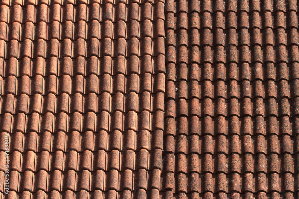 Old ceramic tile roof close up. background Old ceramic tile roof close up. background