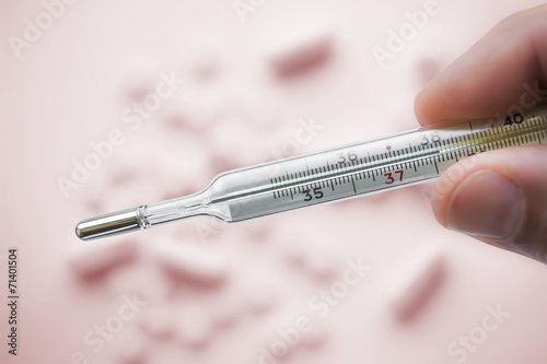 Mercury thermometer which showing 38C